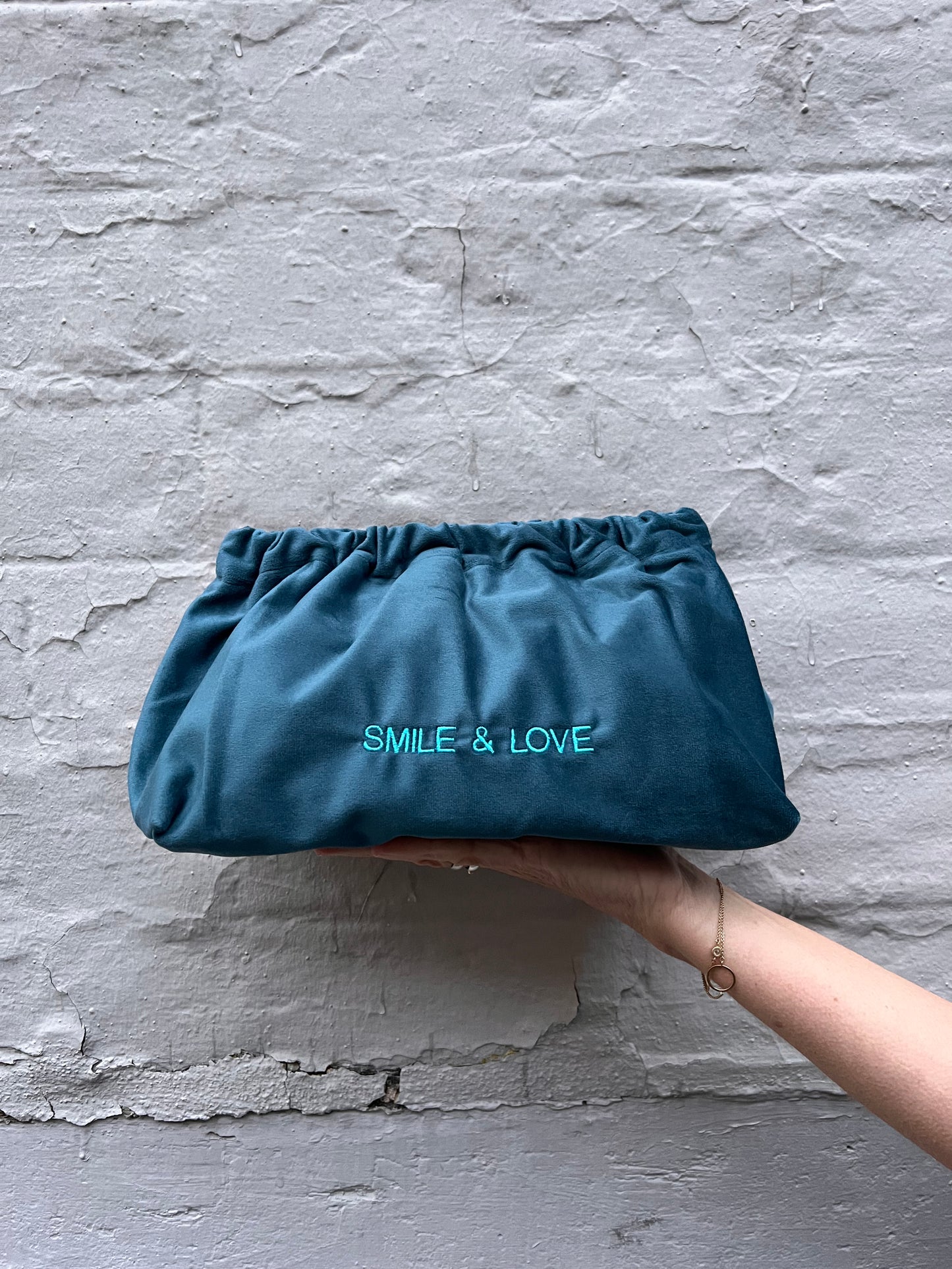 statement clutch made of velvet