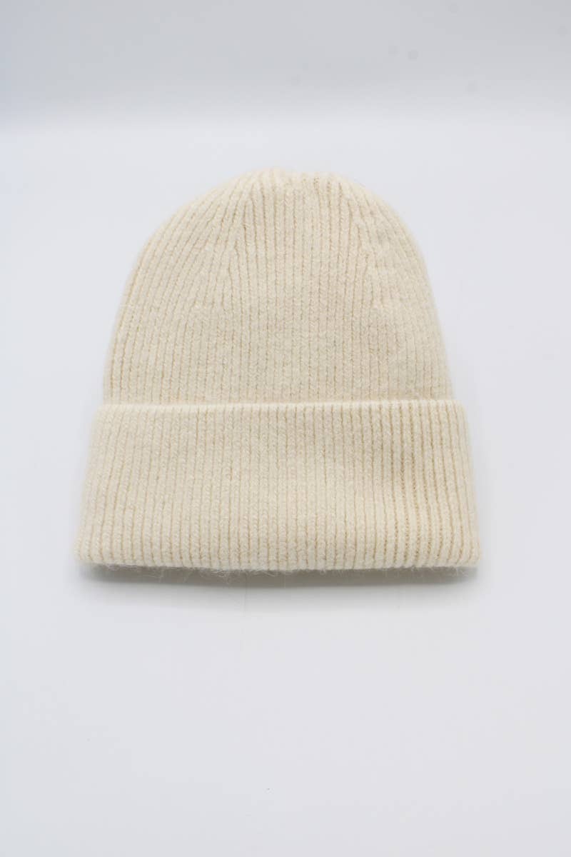 Klassische einfarbige Mütze mit Angora-Futter: Beige