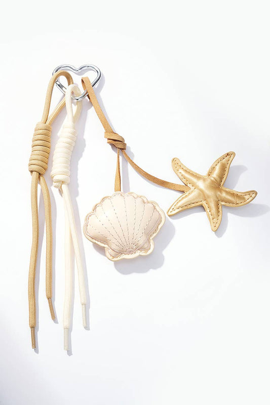 Schlüsselanhänger und Taschenanhänger Muscheln PC43: Beige / Synthetisch